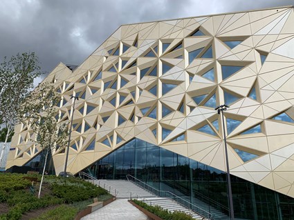 Stairs connect the different ground levels.